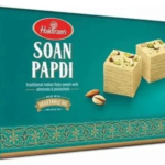 Haldiram’s Soan Papdi is a classic Indian sweet with a light, flaky and melt-in-the-mouth texture. Perfect for festivals, gifting, celebrations and everyday sweet cravings.